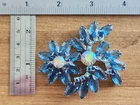 Vintage Unsigned Costume Jewelry - Silver and Blue Rhinestone Flower Brooch