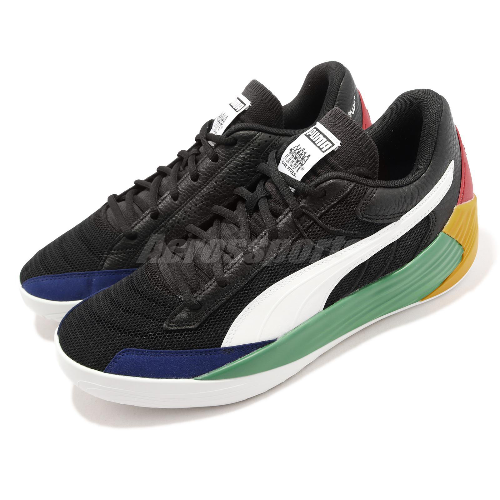 puma black and green shoes