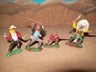 Four riginal vintage Marx from Hong Kong 45mm painted Western figures, OP
