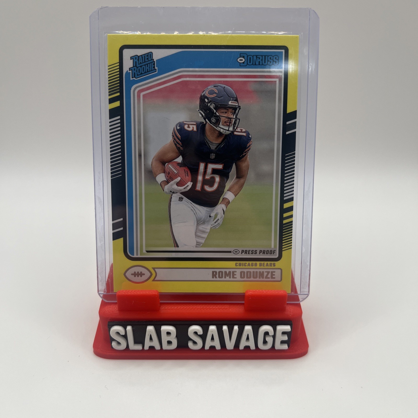 2024 Panini Donruss - Rated Rookie Rome Odunze #309 Press Proof Yellow (RC)