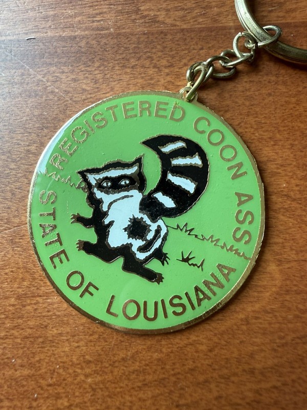 State of Louisiana  Registered 'Coon Ass'  Keychain NEW
