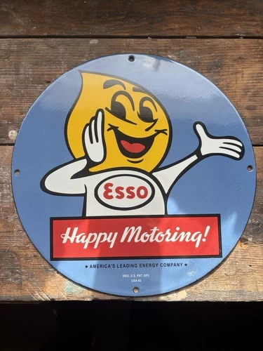 VINTAGE 1962 ESSO GASOLINE HAPPY MOTORING 12 INCH PORCELAIN ENAMEL SIGN