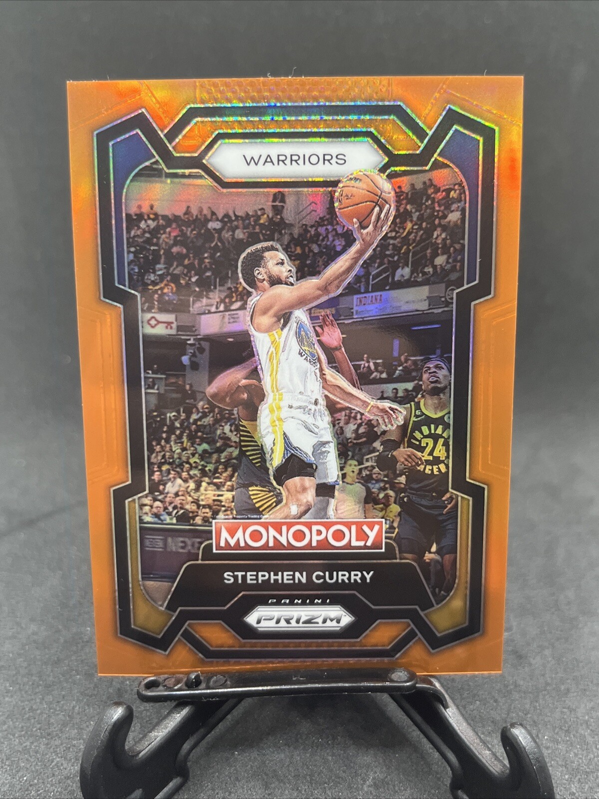 2023-24 Panini Prizm Monopoly Stephen Curry Orange Prizm /124 Card #28