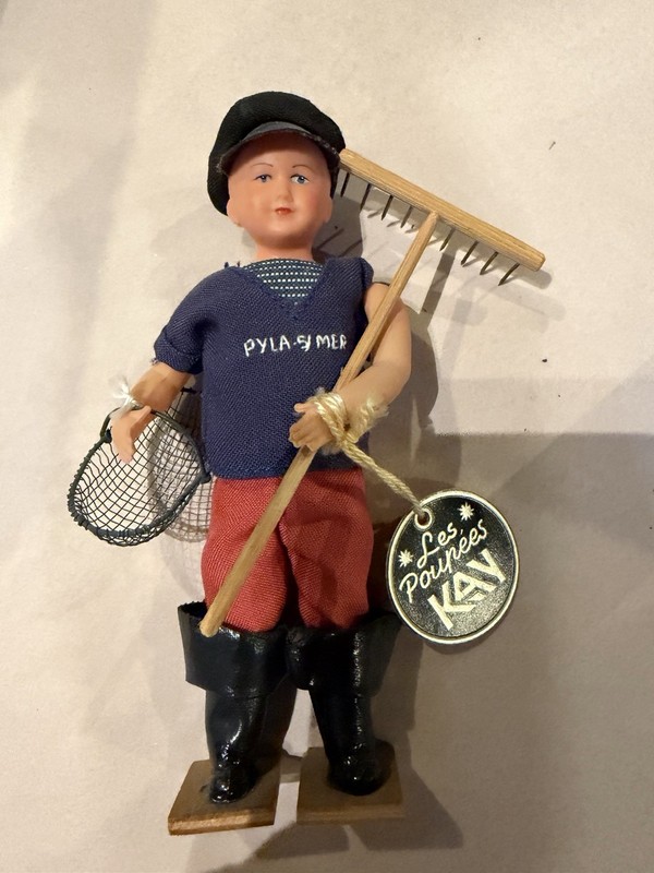 Vintage French Celluloid Doll With Basket & Rake 