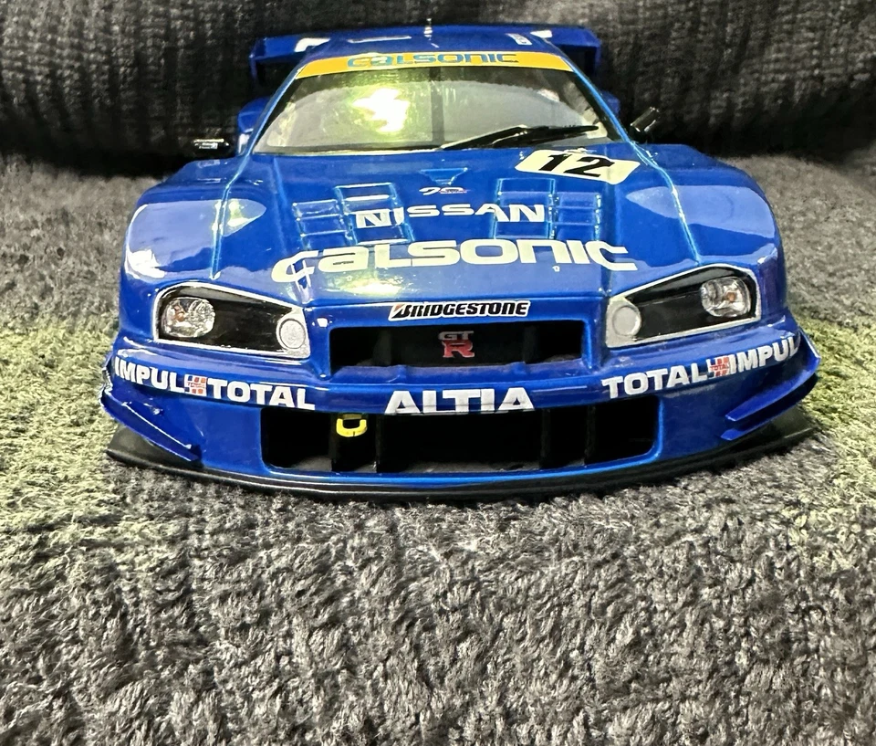 DIECAST MUSCLE MACHINES NISSAN  GT-R CALSONIC SKYLINE 2003 SERIES 1:24 VGC. - Image 4 of 4