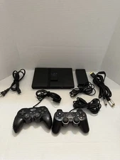Sony PlayStation 2 Slim Console with controller, memory card - power/video cords
