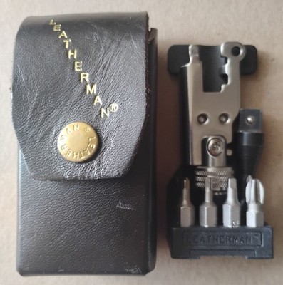 LEATHERMAN TOOL ADAPTER WITH LEATHER CASE-8 BITS-INCLUDES 1/4 & 3/8 SOCKET DRIVE