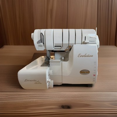 Baby Lock Evolution BLE8W-2 Air Threading Serger Cover Stitch 8 Cone Machine
