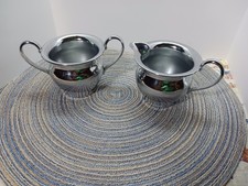 VINTAGE FARBERWARE STAINLESS STEEL CHROME CREAM AND SUGAR SET WITH HANDLES