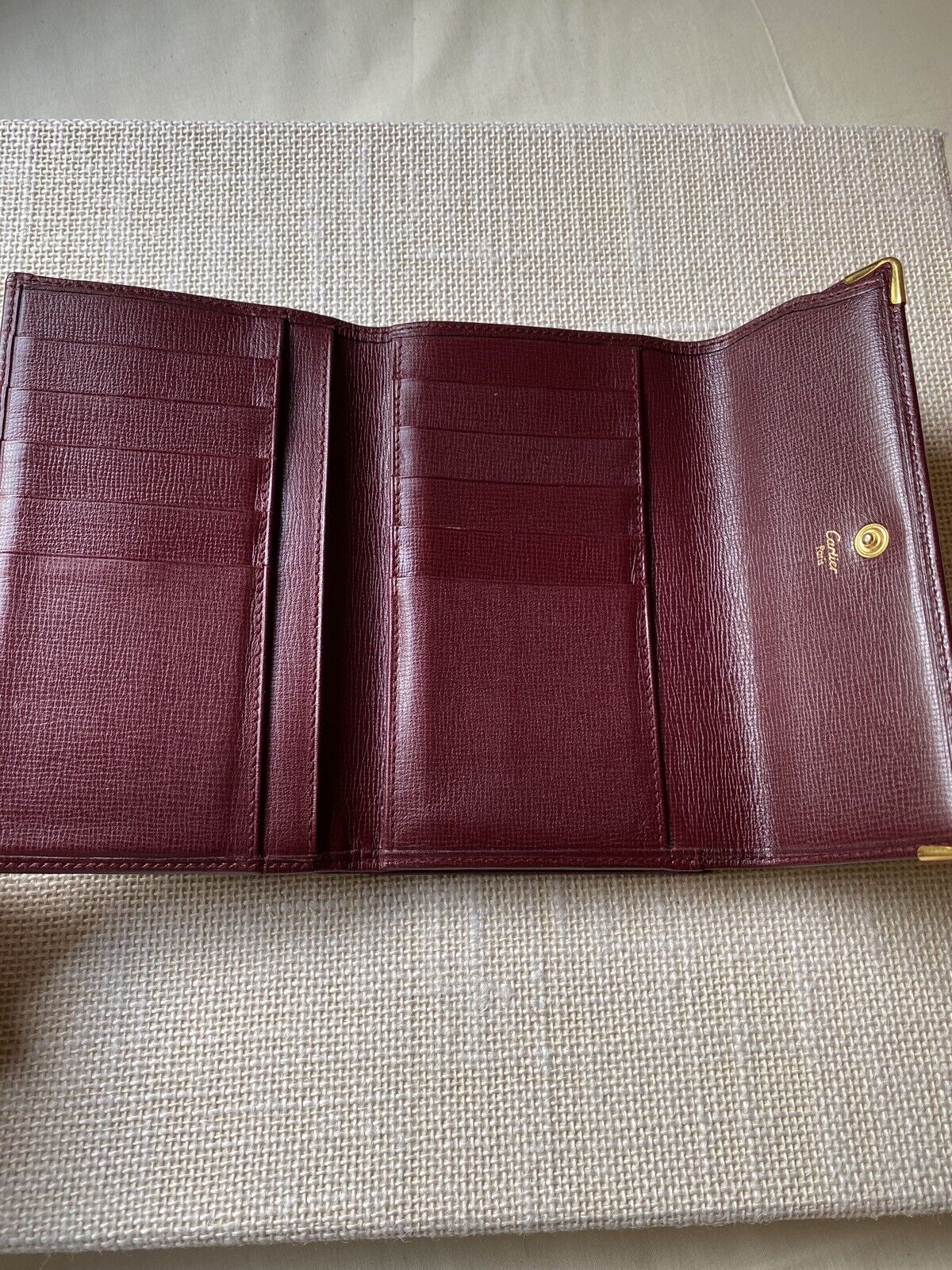 CRL3001360 - International Wallet with Gussets, Must de Cartier - Burgundy  calfskin, golden finish - Cartier