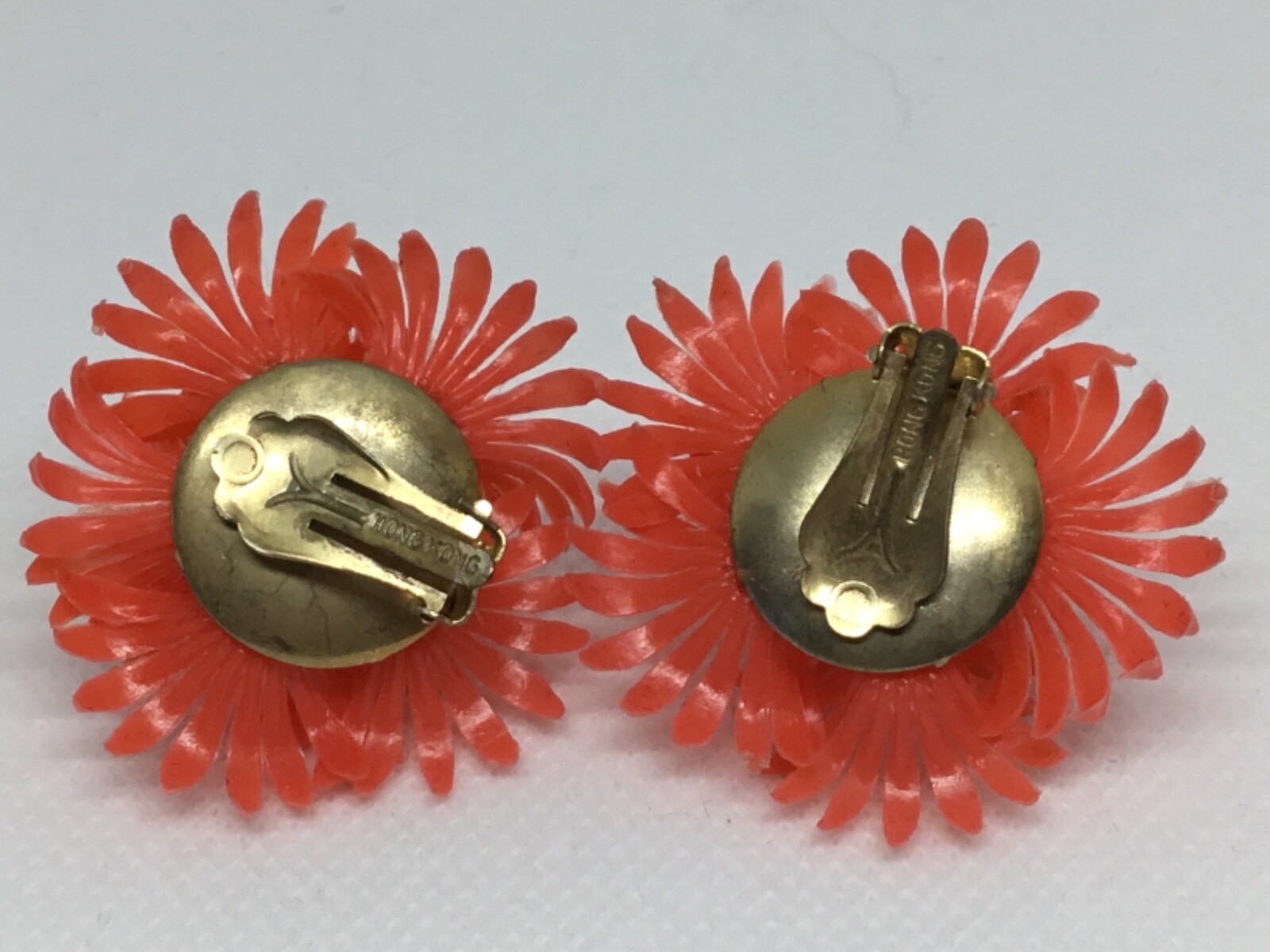 Vintage Plastic Orange Floral Clip on Earrings Signed… Gem