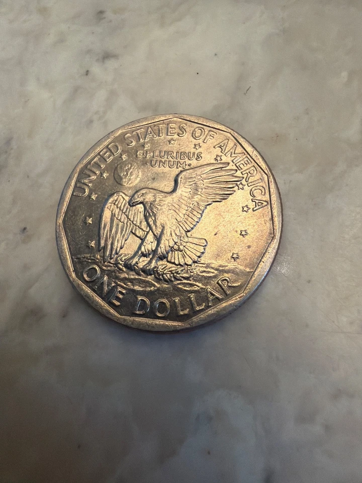 1979-P SBA $1 borde ancho Susan B. Anthony dólar. Foto 2 de 3