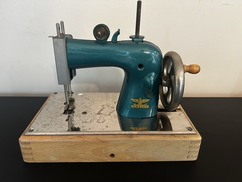 Circa 1940s German Casige Teal/Blue Hand Crank Toy Sewing Machine