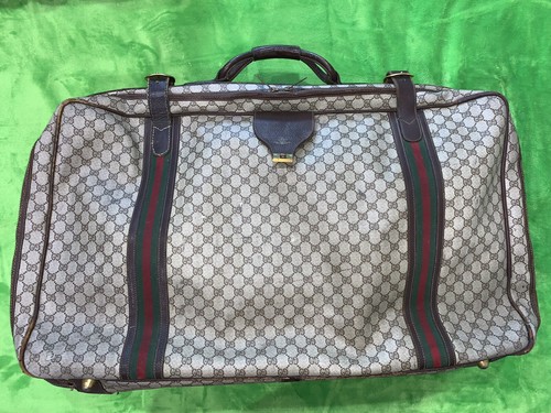 large gucci suitcase