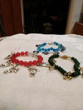 Three Chidrens Brcaelets, Green With Bees, Blue With Cats , Red With Horse Heads