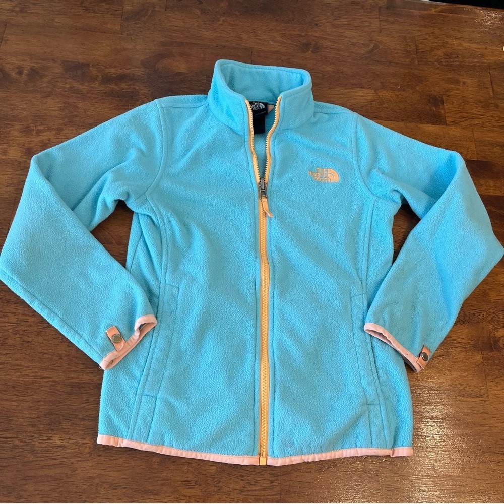 The North Face Turquoise Fleece with Orange Trim jacket size medium girls