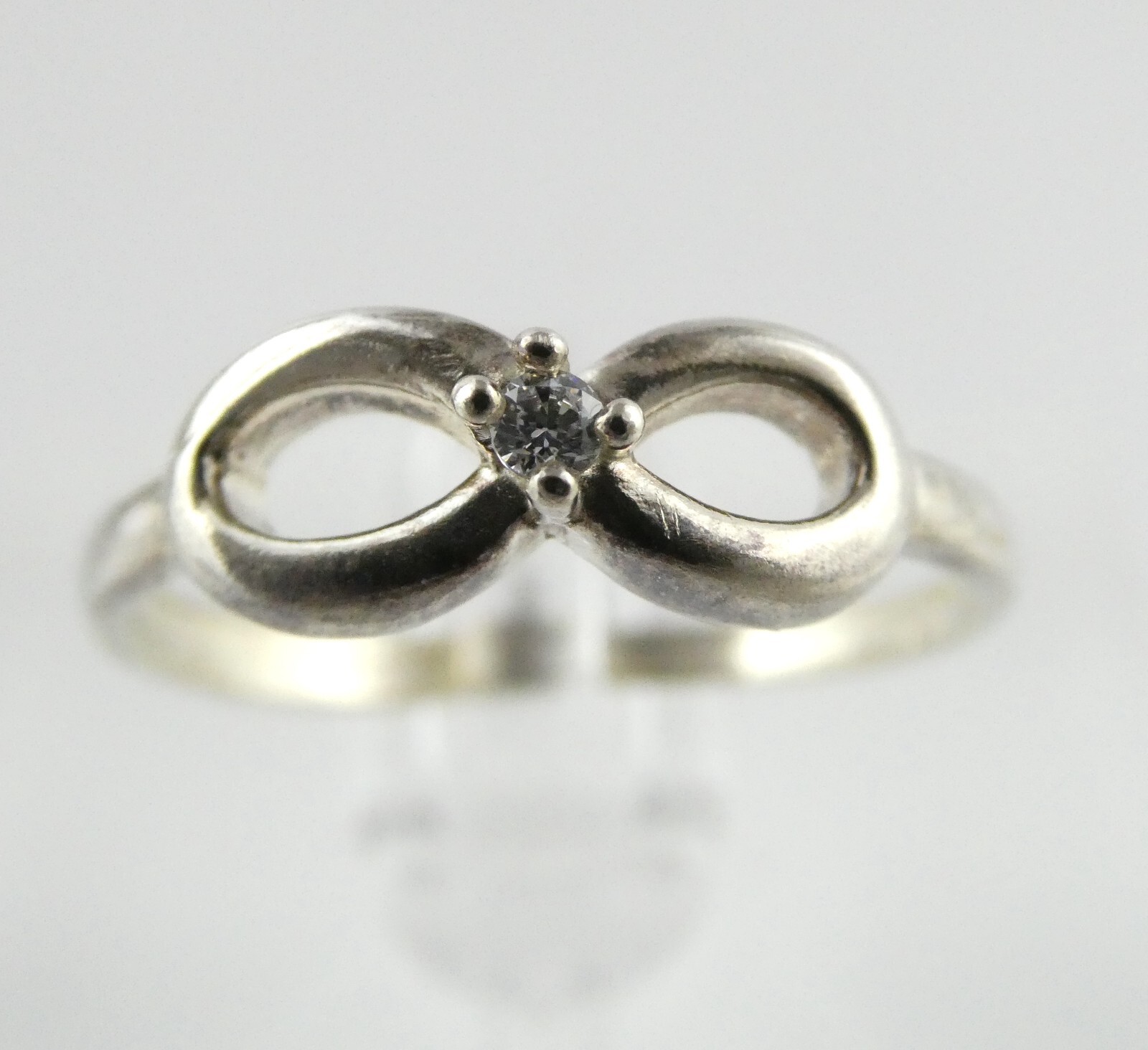 Sterling Silver White Gem Infinity Loop Design Ri… - image 1