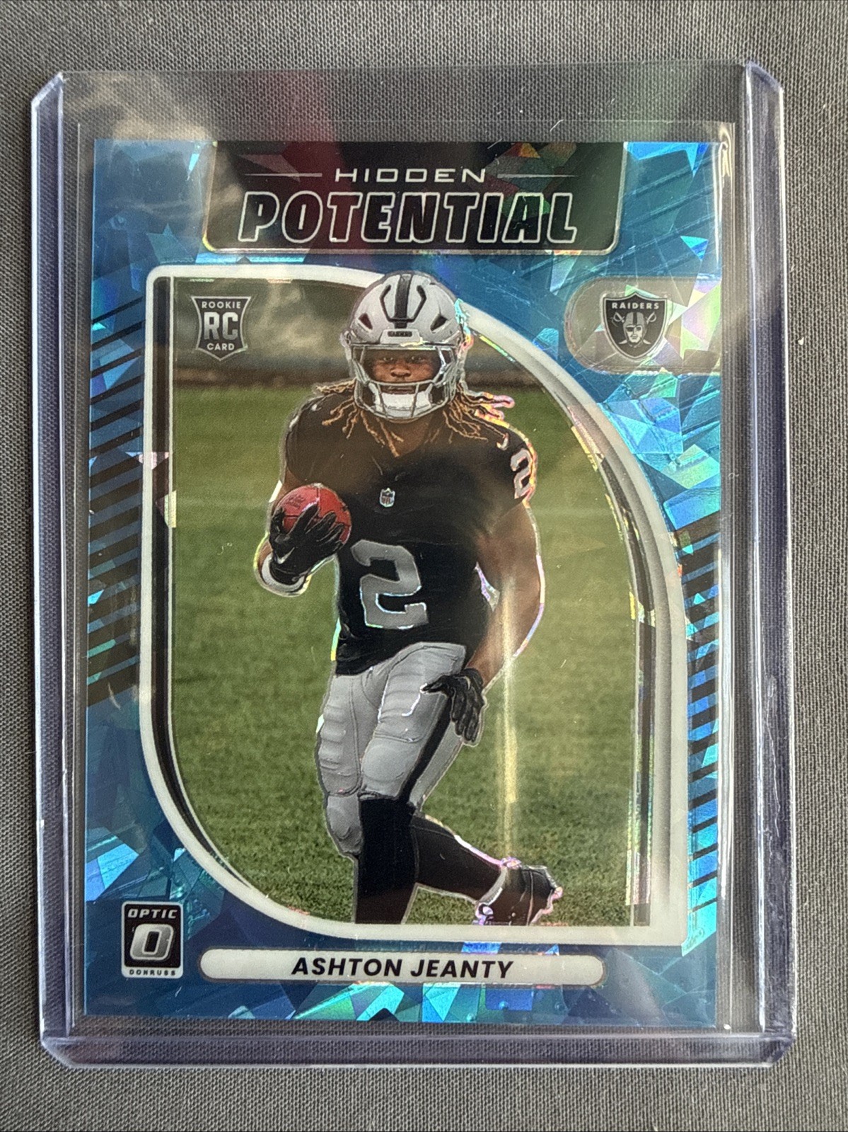 2025 Optic Football Ashton Jeanty Hidden Potential Blue Cracked Ice /55
