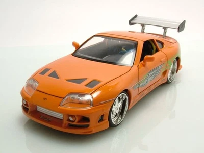 Toyota Supra 1995 orange Fast & Furious mit Brian Figur Modellauto 1:24 Jada Toy - Bild 1 von 4
