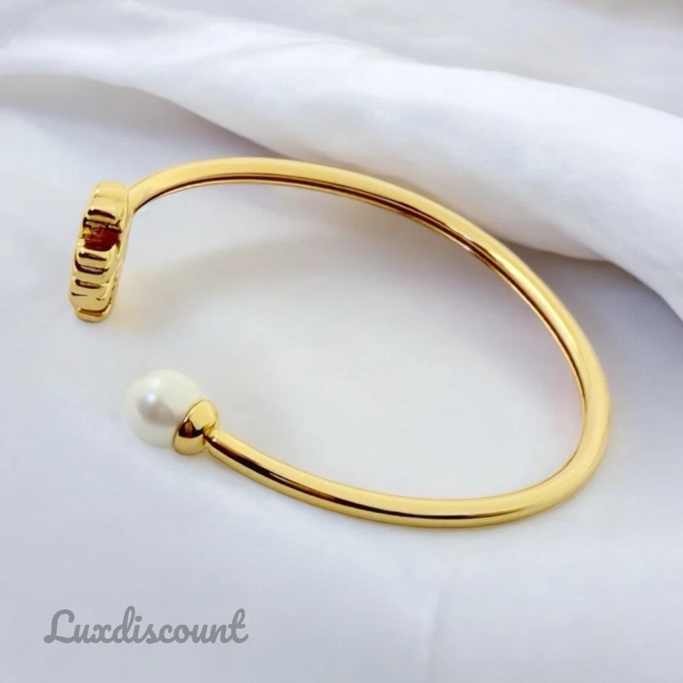 Pulseira Tory Burch folheada a ouro 18K com logotipo de corda texturizada pérola punho flexível - Imagem 4 de 4