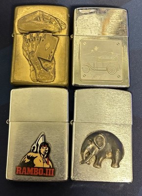 4 Zippo Set: Elefant (funkt) + 3 ohne Funke (Rambo, Barrett-Smythe, Auto) 92-03