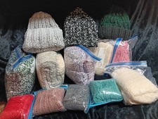 Homemade Knit Scarves, hats, fingerless gloves in variuos colors and styles.