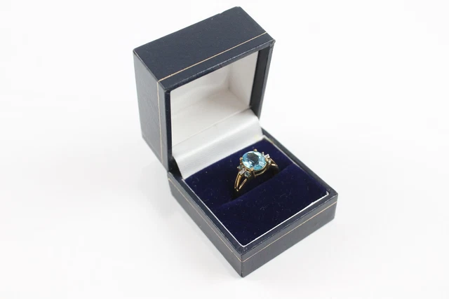 25 9ct Yellow Gold Ring DK Blue Topaz Diamond Boxed