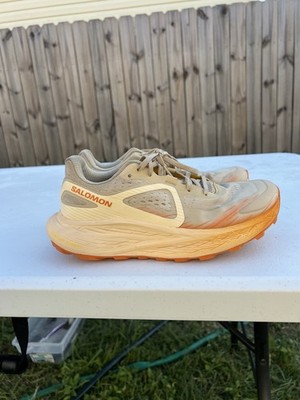 Women's Salomon Glide Max TR trail running shoe in a tan and orange Size 9
