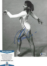 NADIA COMANECI SIGNED OLYMPIC GOLD MEDAL GYMNAST SIGNED 8X10 PHOTO BECKETT BAS
