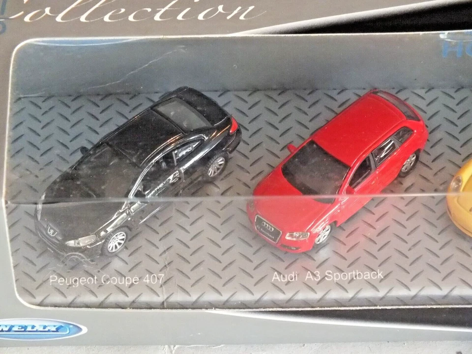 Welly cofanetto 4 auto mint/box scala H0 1/87 Porsche Mercedes Audi Peugeot - Immagine 2 di 3