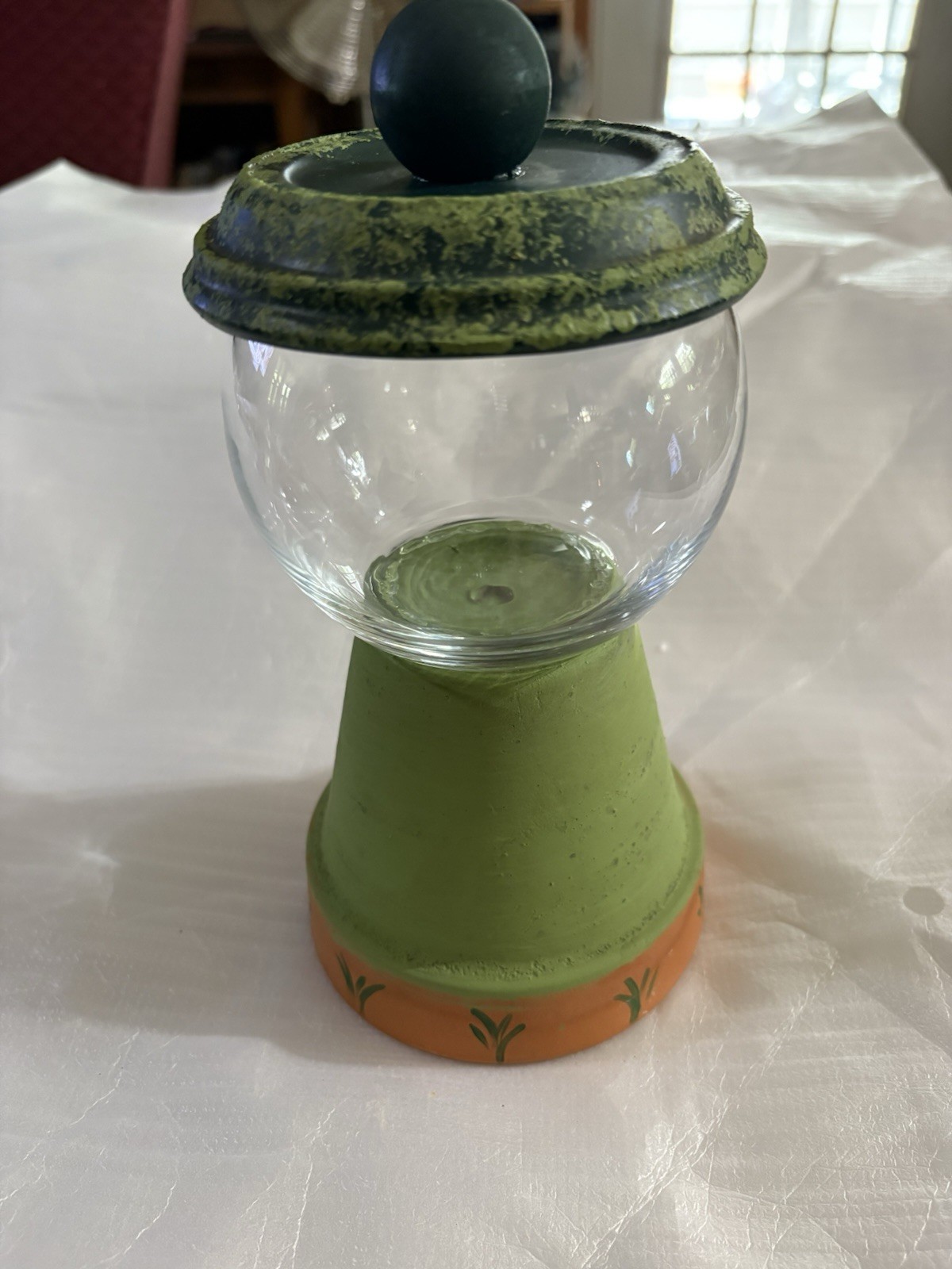 Vintage clay pot with glass globe for candy, cotton balls, or Q-tips display