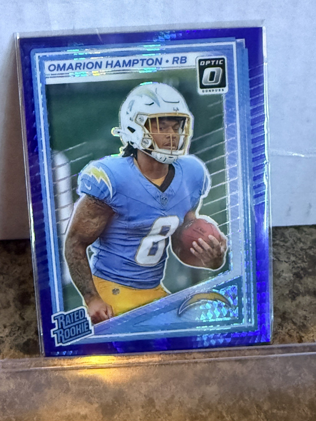 2025 Panini  Optic - Rated Rookie Omarion Hampton #212 Blue Hyper Prizm