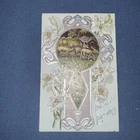 Antique Easter greetings postcard with sheep