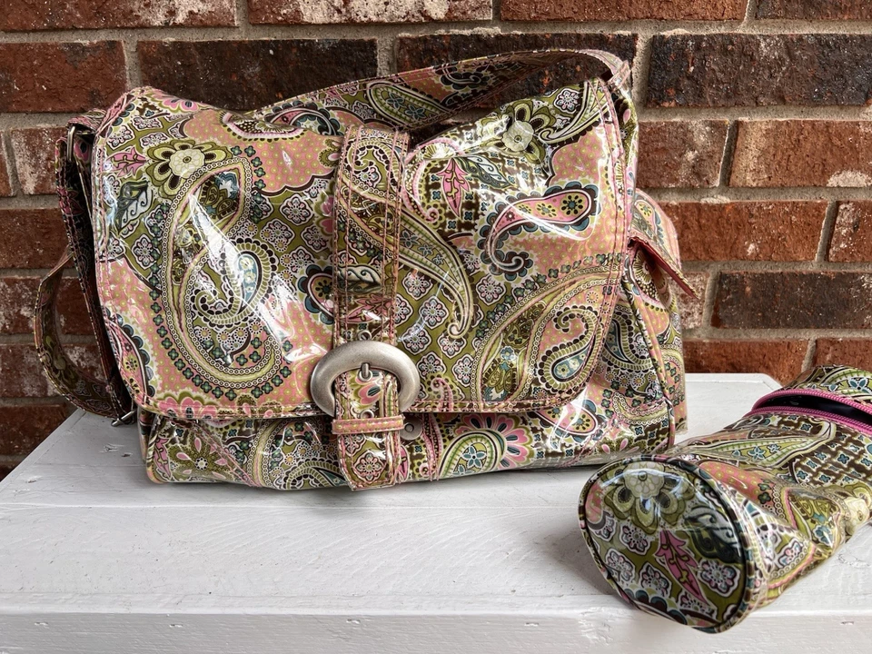 Bolsa de pañales para bebé mensajero con hebilla laminada Kalencom + portabiberones - Usada Foto 4 de 4