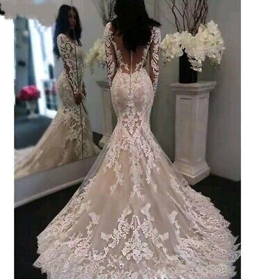 fishtail wedding dress with long sleeves