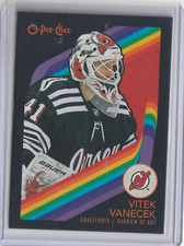2023-24 OPC Vitek Vanecek Black Retro #21, 61/100 New Jersey Devils Mint