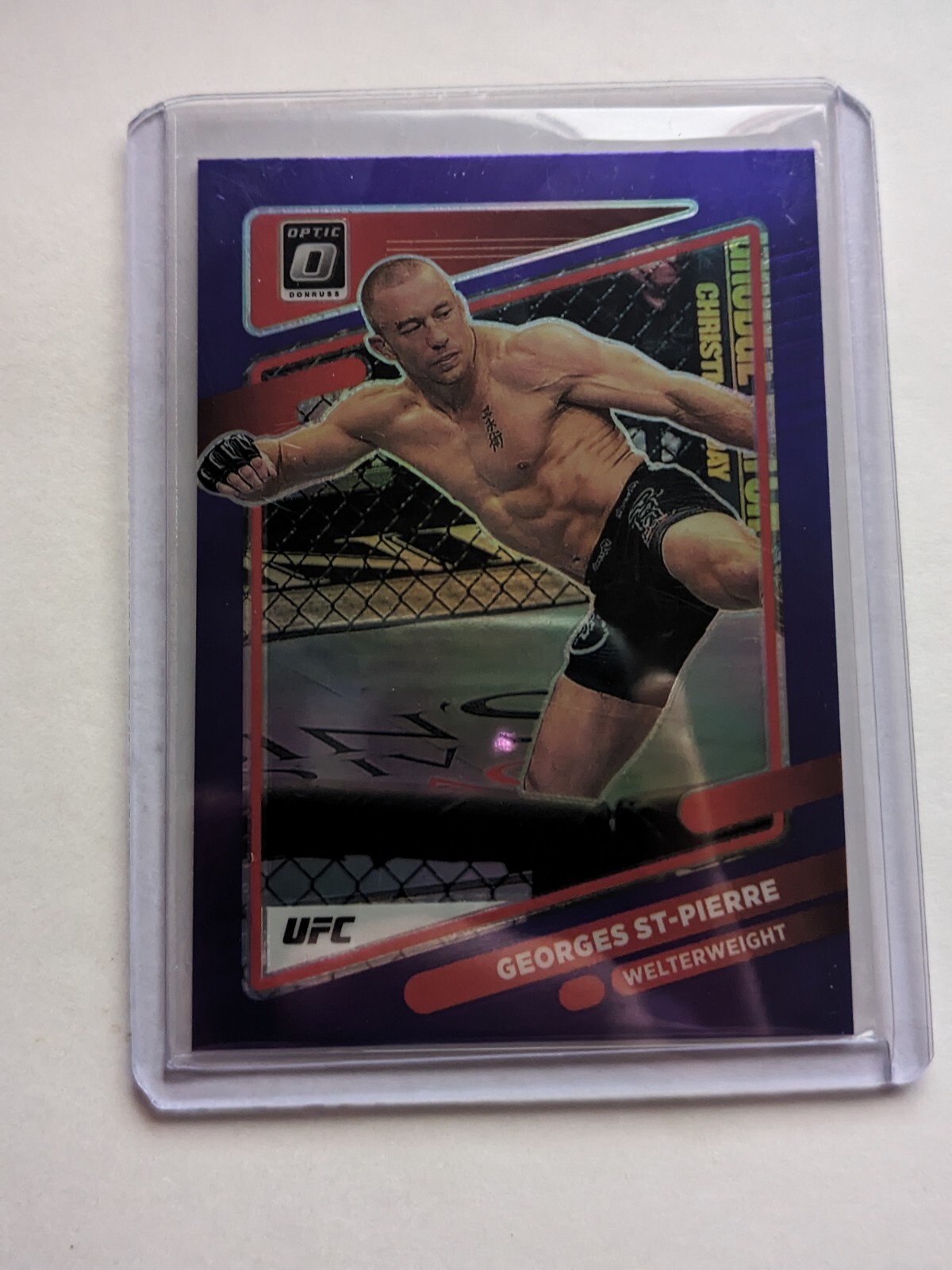 2022 Panini Optic UFC #57 Georges St Pierre Purple Prizm GSP