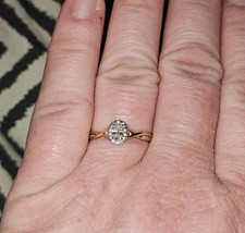 Halo Ring. 9 Carat Gold And Diamond. From TH Baker.