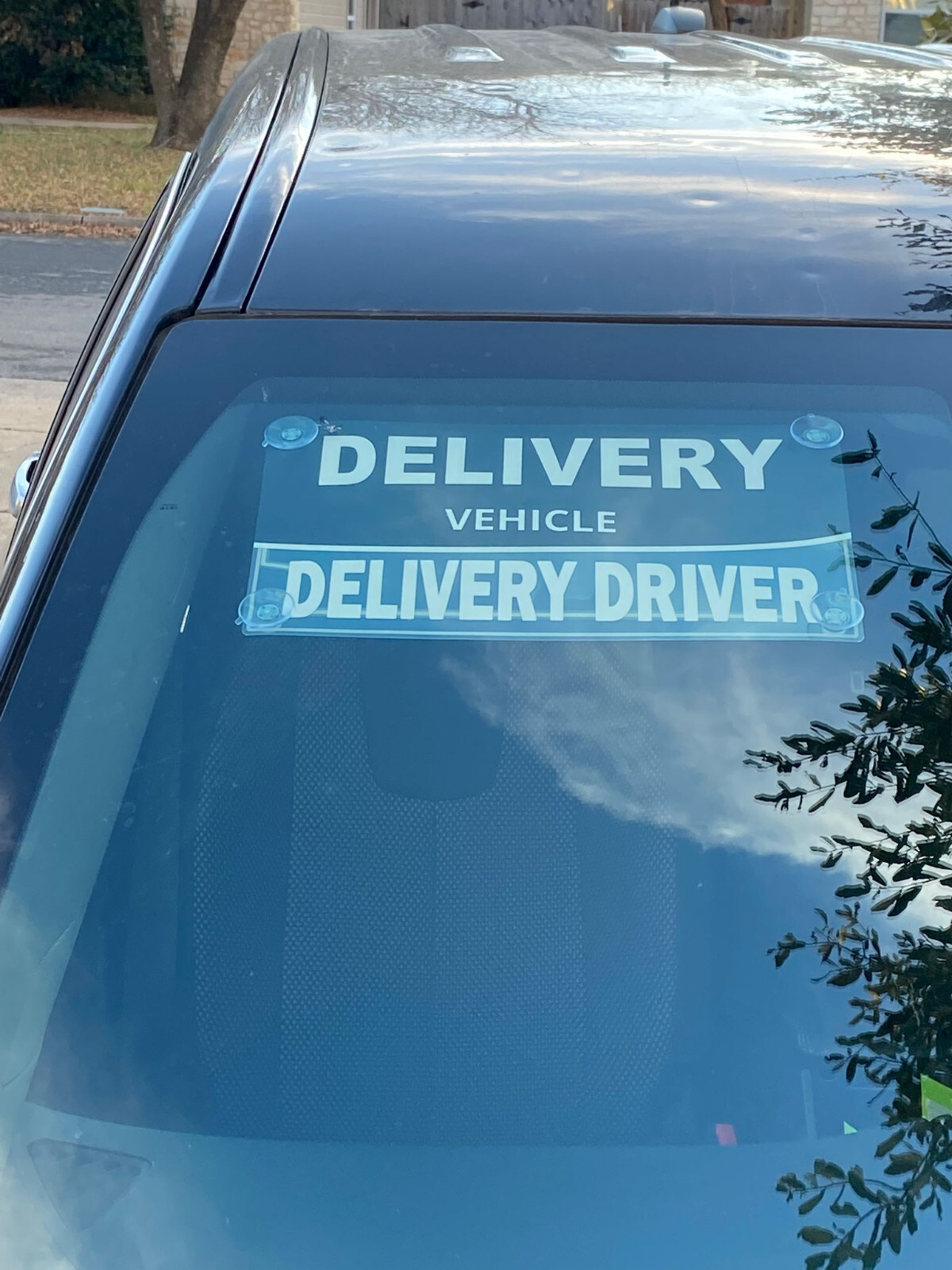 delivery driver car sign