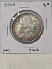 1882-O- MORGAN SILVER DOLLAR- TONING- NICE COIN- NR AUCTION