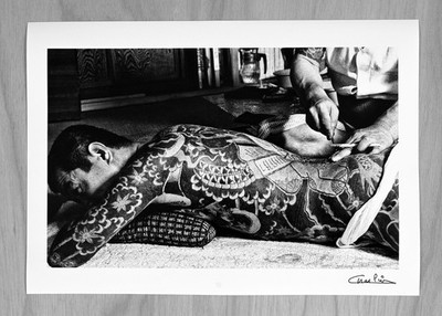 Japanese Yakuza getting work on  his Sōshibori by tattoo master in Tokyo 1977
