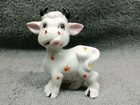 Porcelain Kitsch Cow With Orange Star Bursts Japan — photo 1