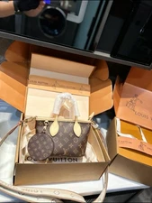 Louis Vuitton Neverfull BB with vachetta leather trim and gold