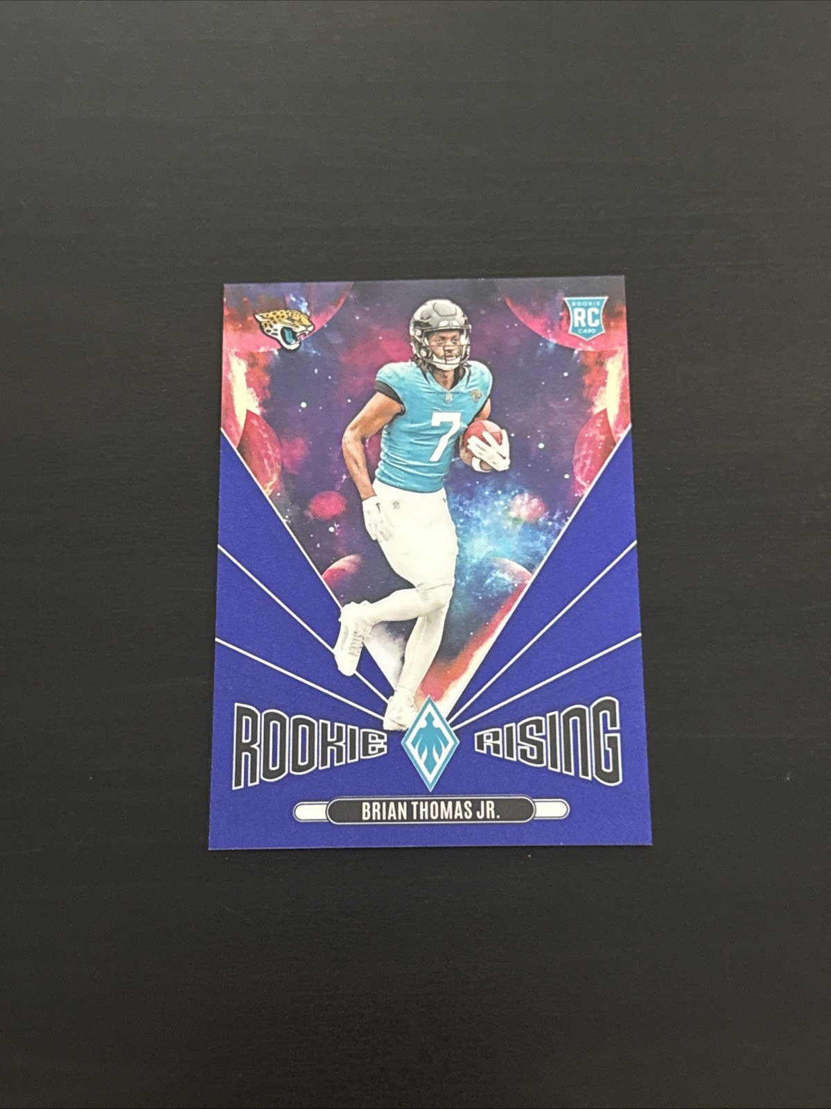 2024 Panini Phoenix Brian Thomas Jr. Rookie Rising RC Blue Rookie #14/50