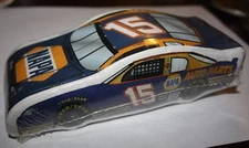 NAPA AUTOMOBILE WHITE T SHIRT SHRUNK INTO A STOCK CAR