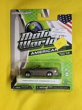 GreenLight 1999 Pontiac Firebird T/A Motor World American Edition 1:64  N