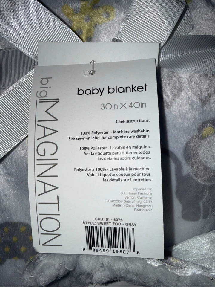 NUEVO CON ETIQUETAS Hogar Reversible Gris/Amarillo Visón y Pom Pom Piel Selva Elefante León Manta Foto 2 de 4