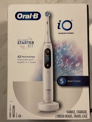 Oral-B Pro IO Starter Kit Rechargeable Toothbrush Charger 2 Brush Heads Case NIB