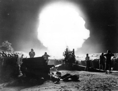 Dramatic shot of 155mm Howitzer fire during night action in Korean- Old Photo