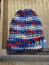 Small Handmade Knitted Multicolored Beanie With Star Pin